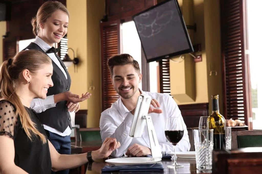 Happy customers being served at a local restaurant